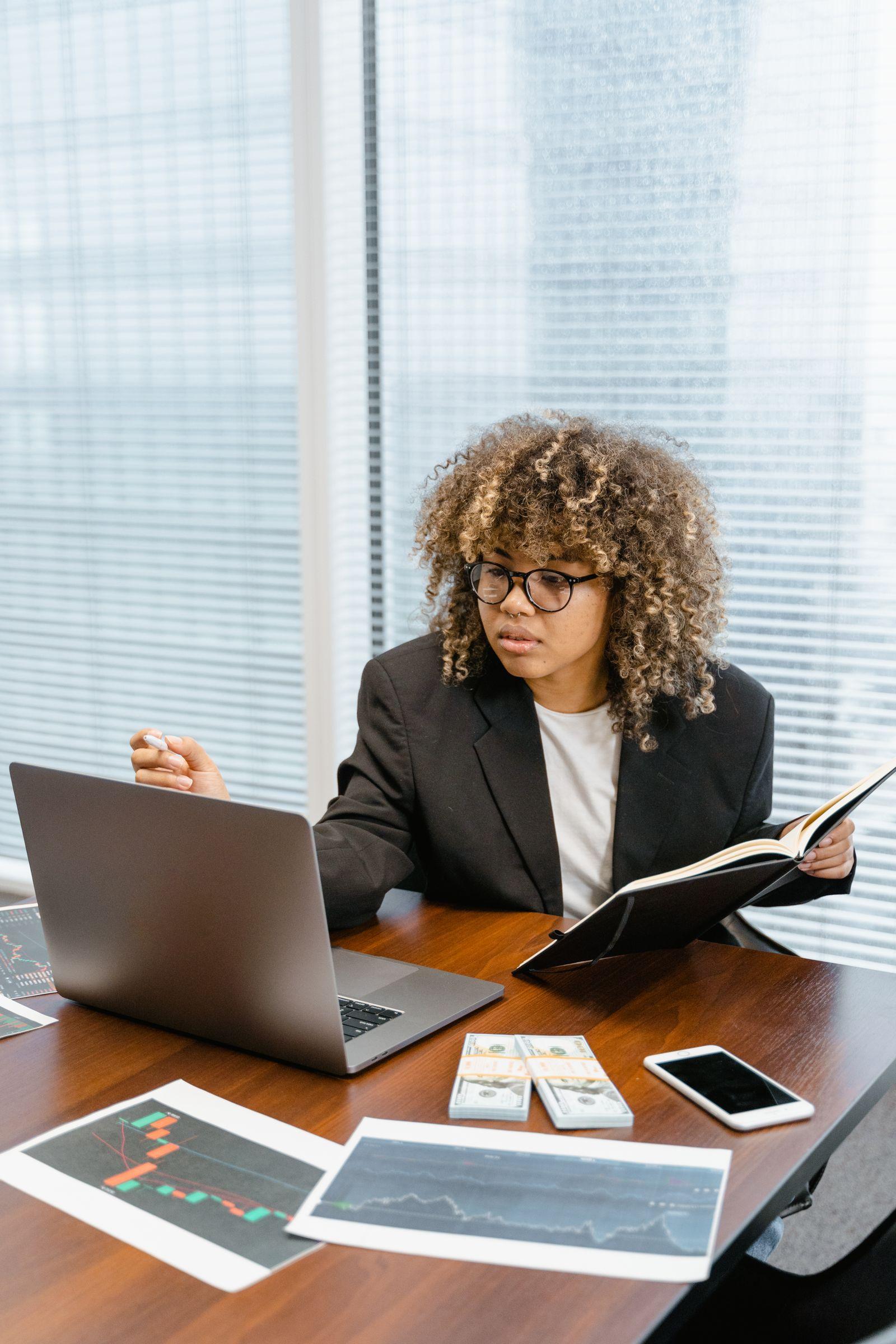 A business owner reviewing data at a desk