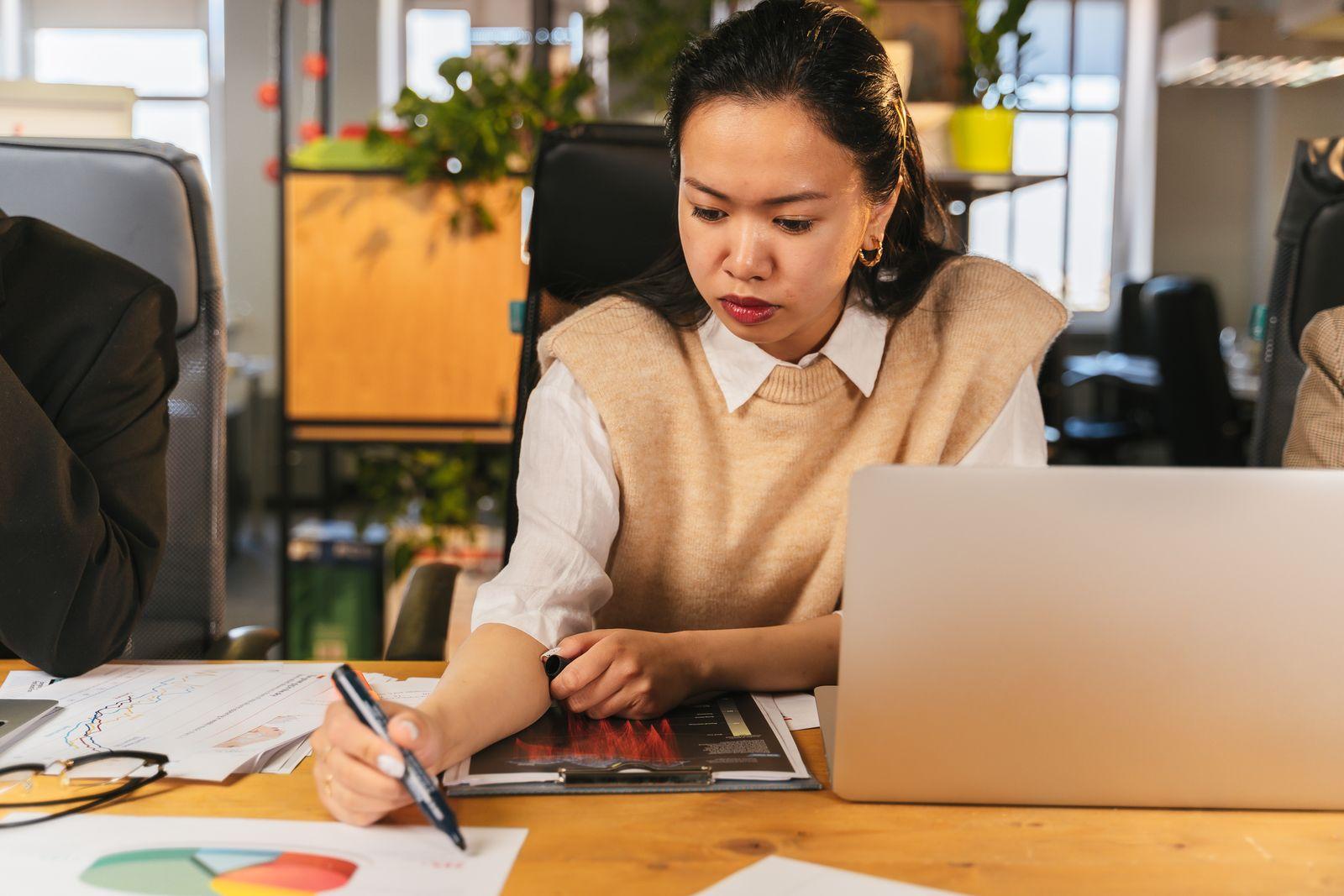 A person planning and analyzing at a computer